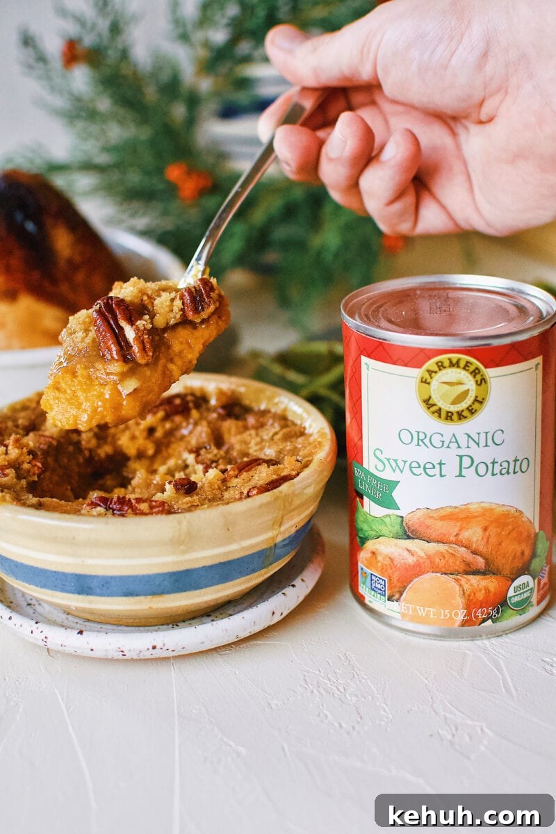Great-Aunt Sally’s Classic Sweet Potato Soufflé Recipe 4 Great Aunt Sally's Sweet Potato Soufflé right out of the oven with a can of Farmers Market Foods Sweet Potato puree next to it.