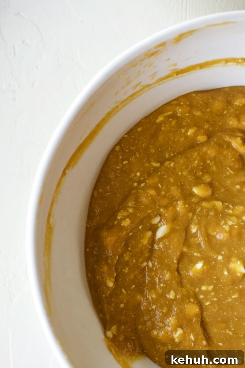 Great-Aunt Sally’s Classic Sweet Potato Soufflé Recipe 7 Step 3, Fold the ingredients together until completely blended.