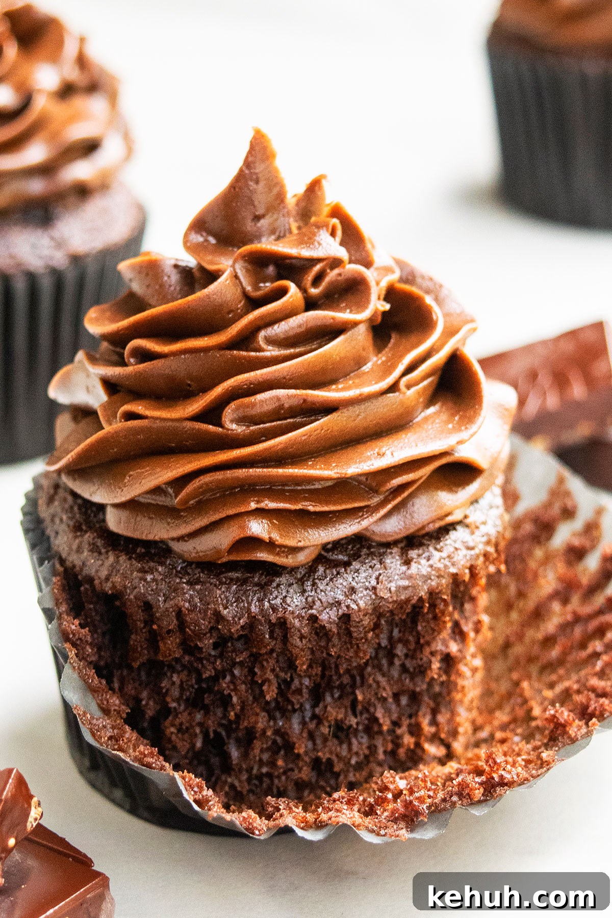Best Easy Chocolate Cupcakes with Chocolate Buttercream Frosting- Liner Partially Peeled.