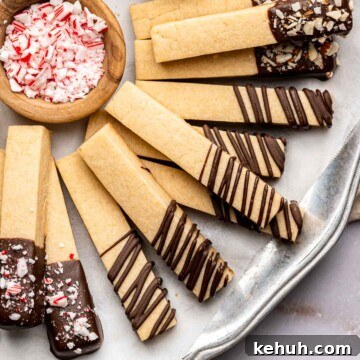Cookie sticks layered on a plate.