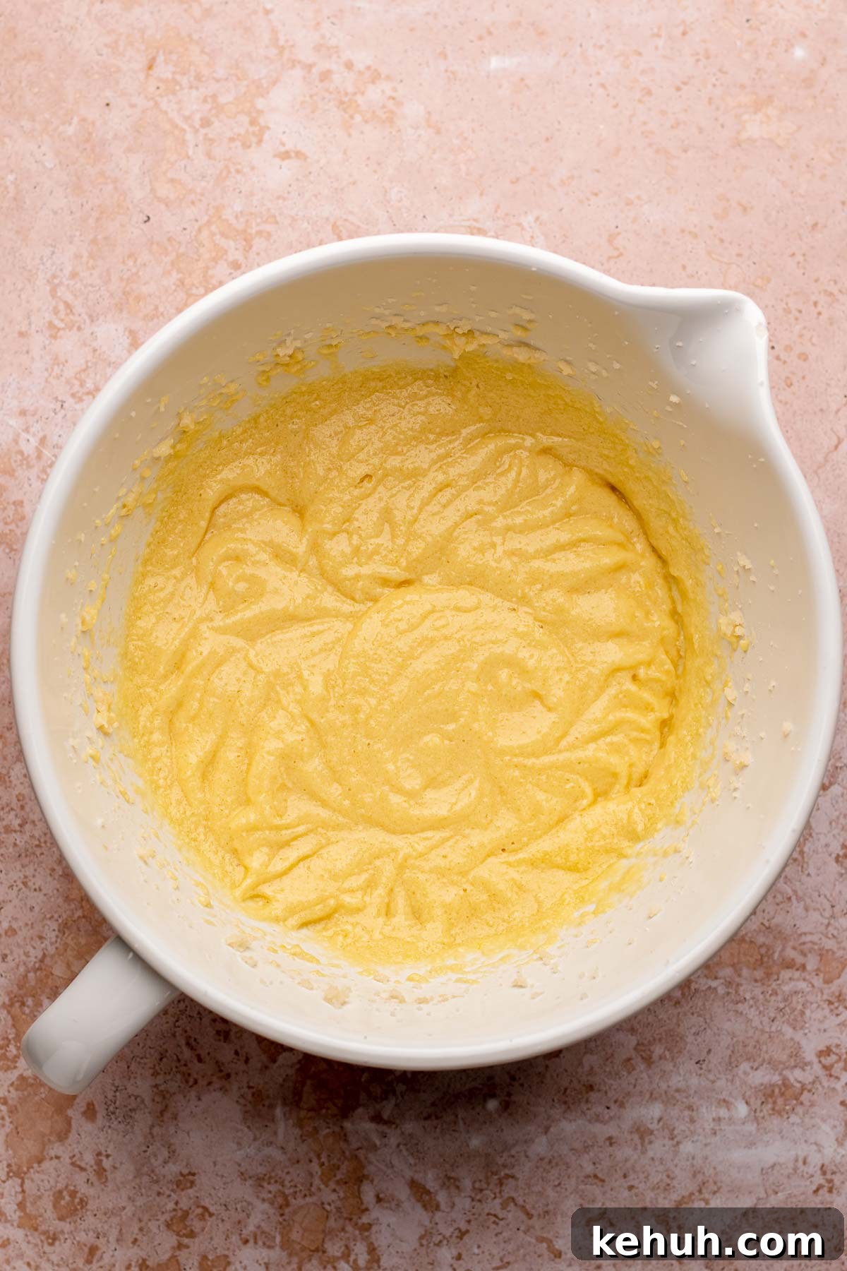 Creamed wet ingredients in a mixing bowl.