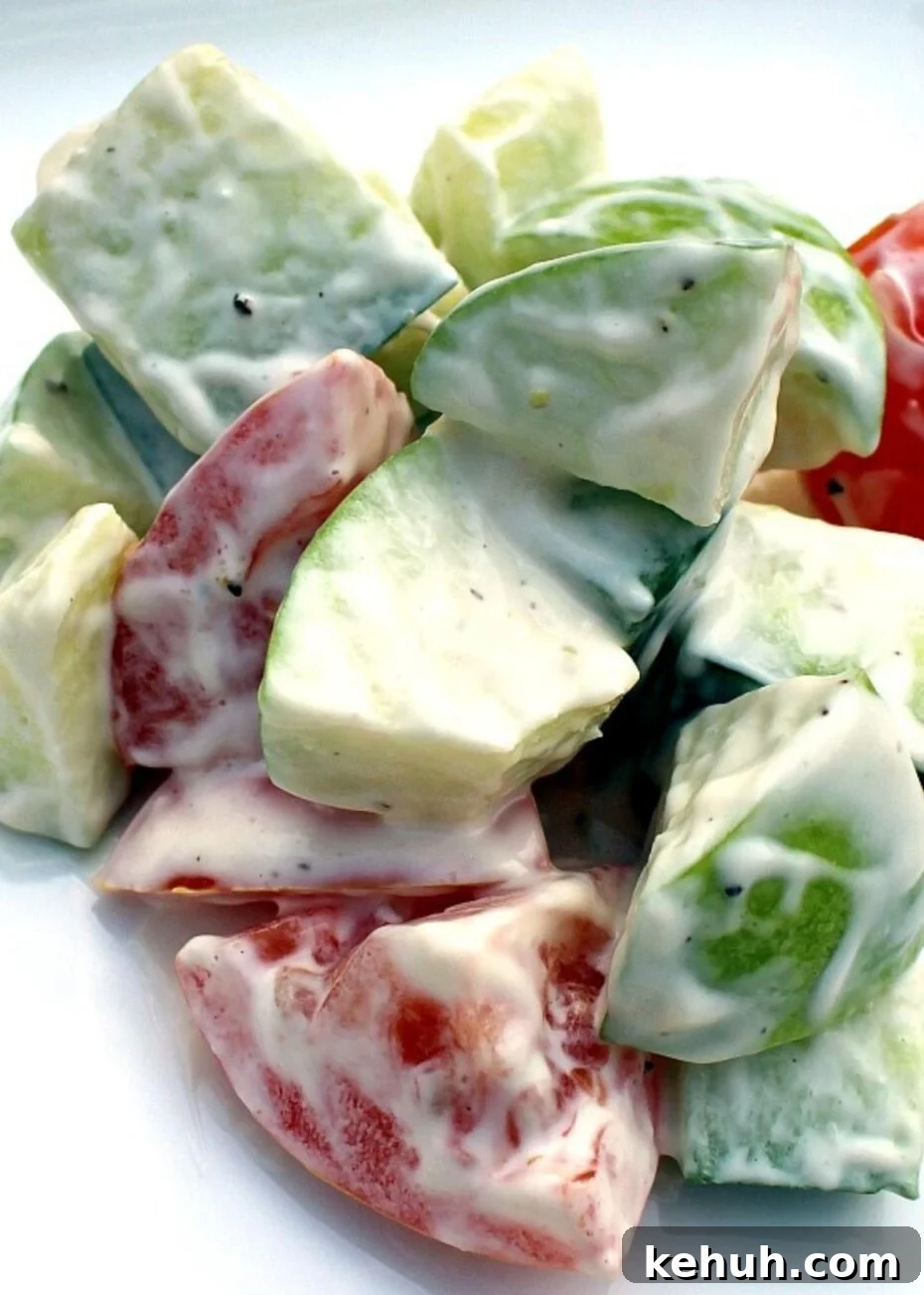 Simple Refreshing Salad. Simple ingredients using apple, cucumber, and tomato combined with a lovely easy yogurt dressing makes for a deliciously refreshing salad.