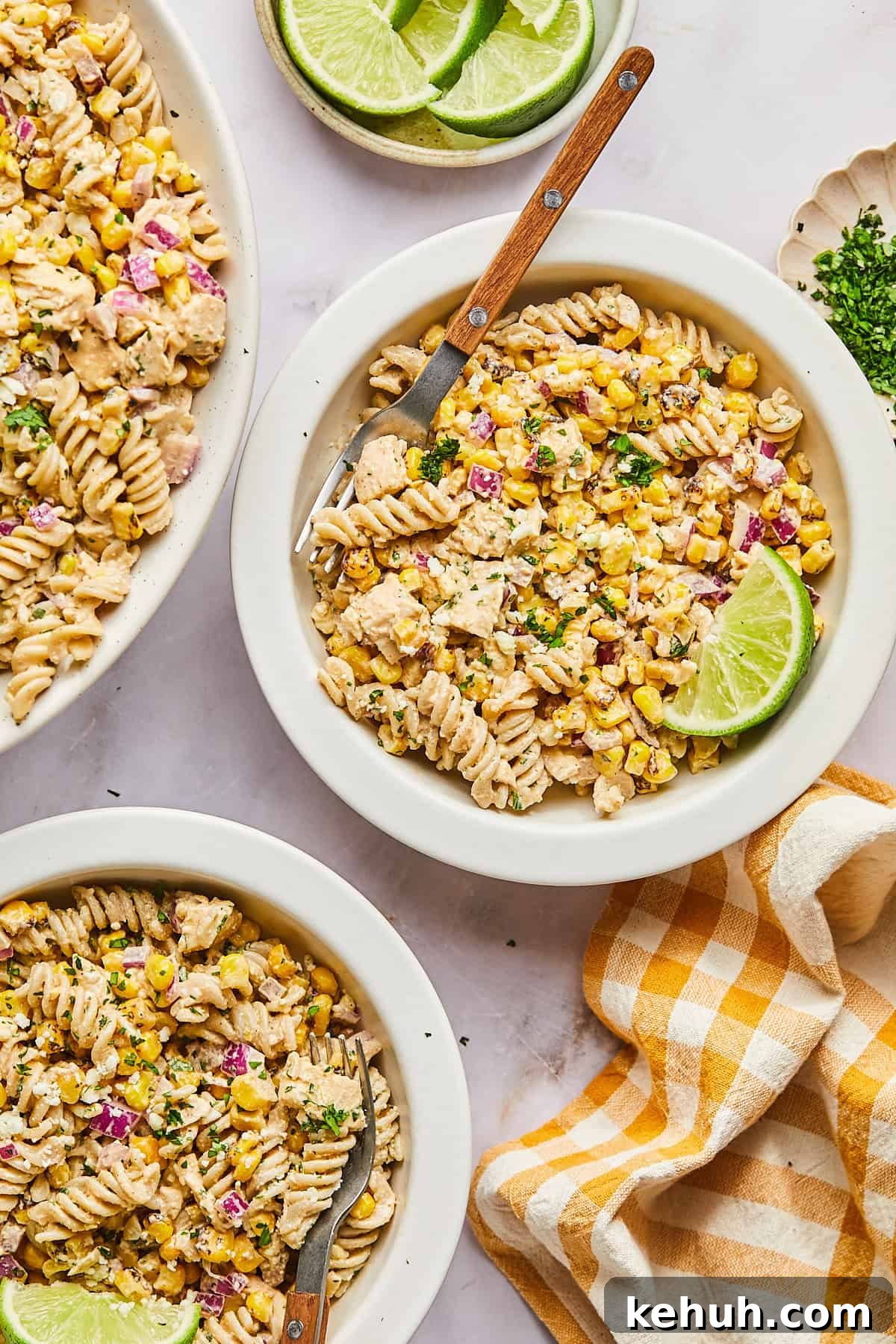 Street corn pasta salad in 3 bowls
