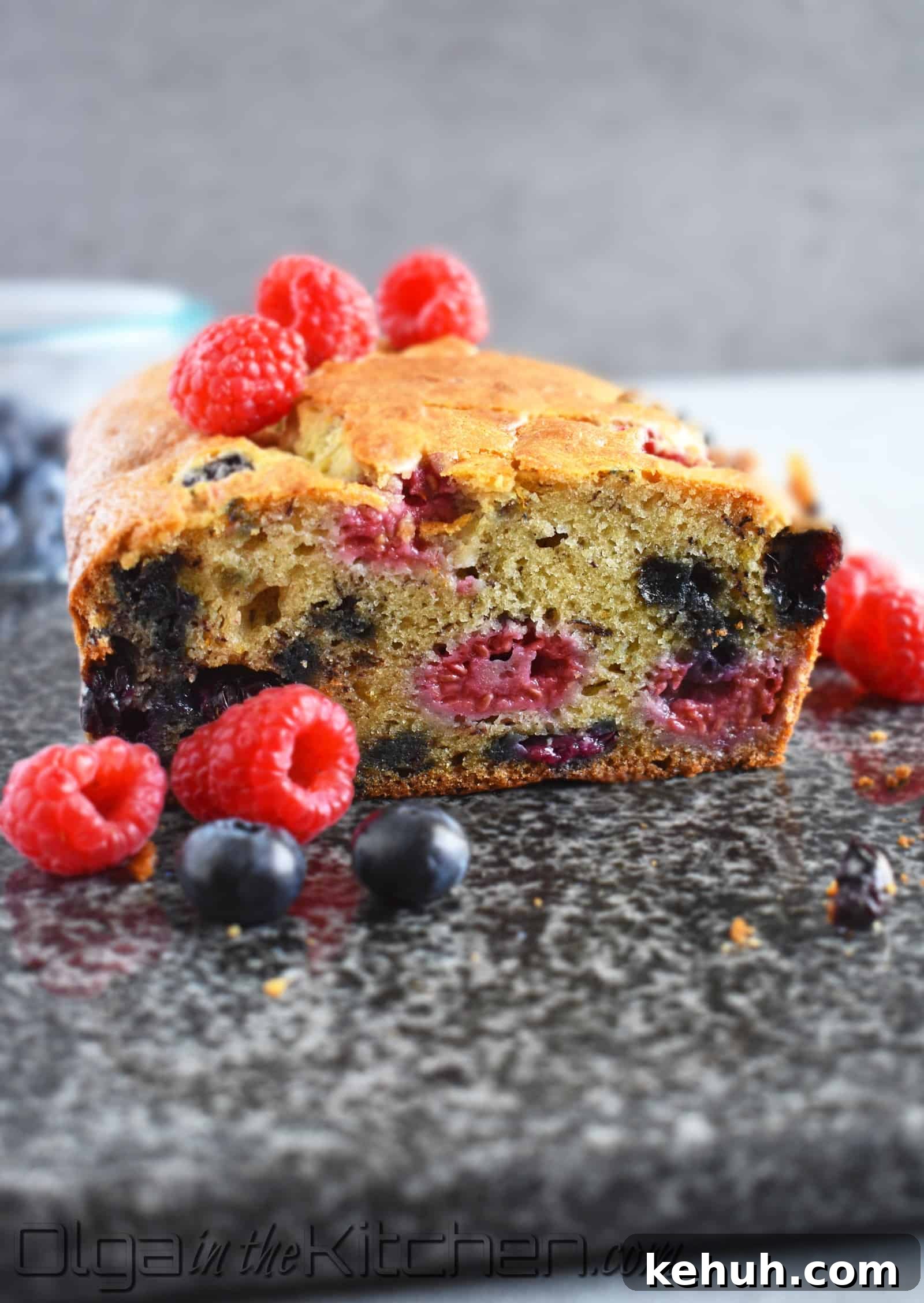 Banana Berries Bread: incredibly moist loaf of banana bread loaded with juicy and fresh blueberries and raspberries with a hint of orange.