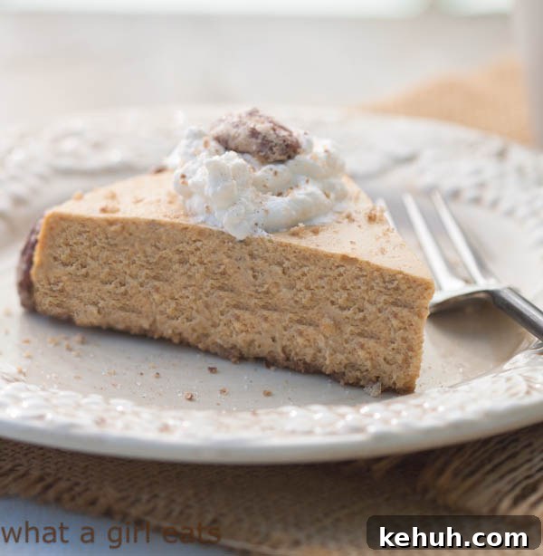 Pumpkin Spice Cheesecake with Bourbon Maple Whipped Cream