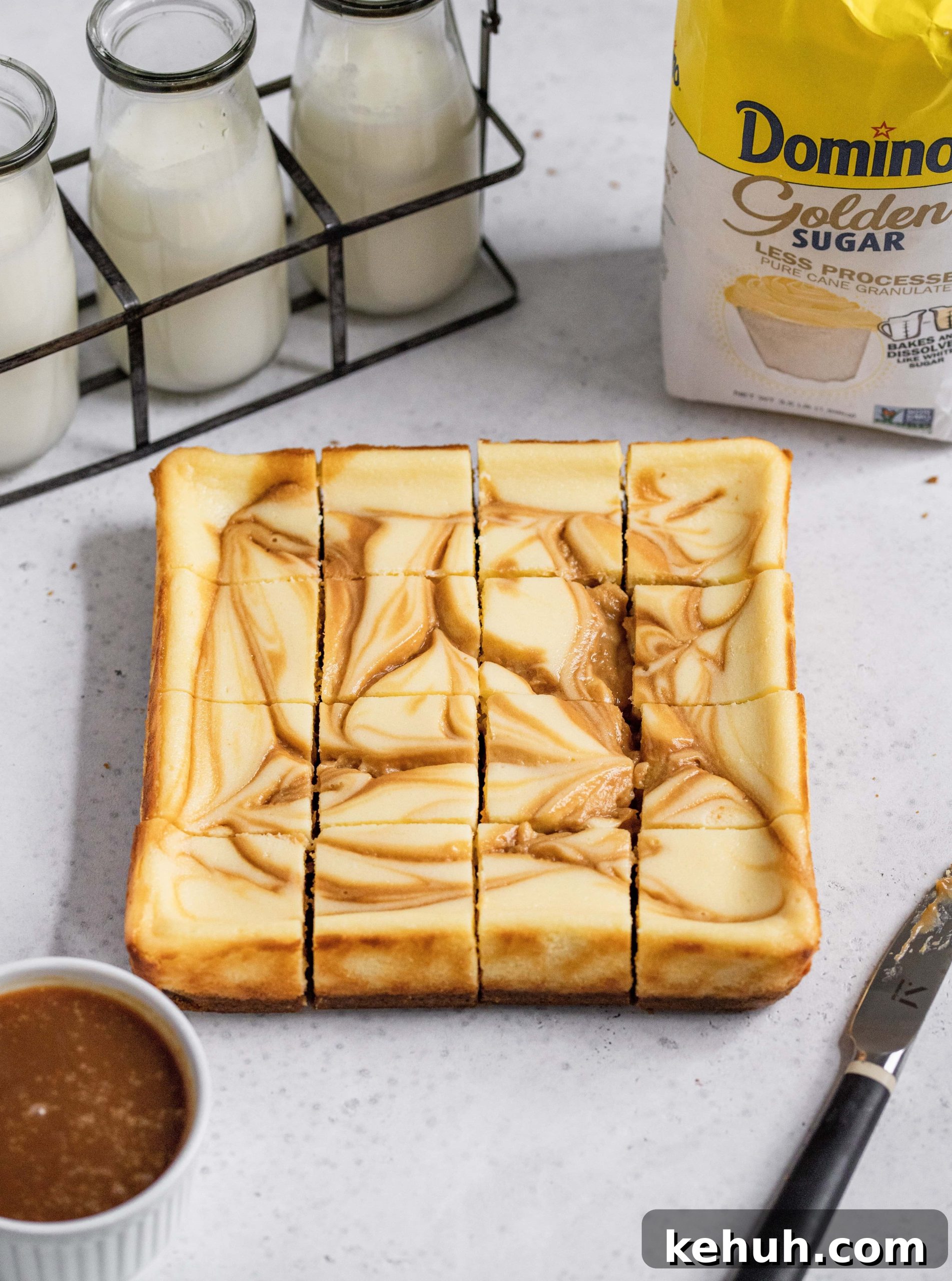 Salted Caramel Swirl Cheesecake Bars Recipe for Parties 3 Salted caramel swirl cheesecake bars and golden sugar