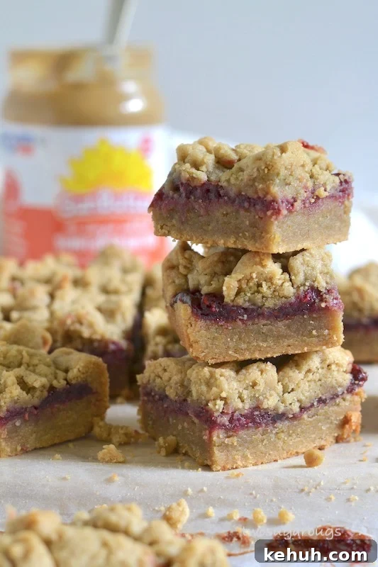 Sunbutter and Jelly Bars Recipe — No-Bake Snack Squares 2 Stack of Sunbutter and jelly bars