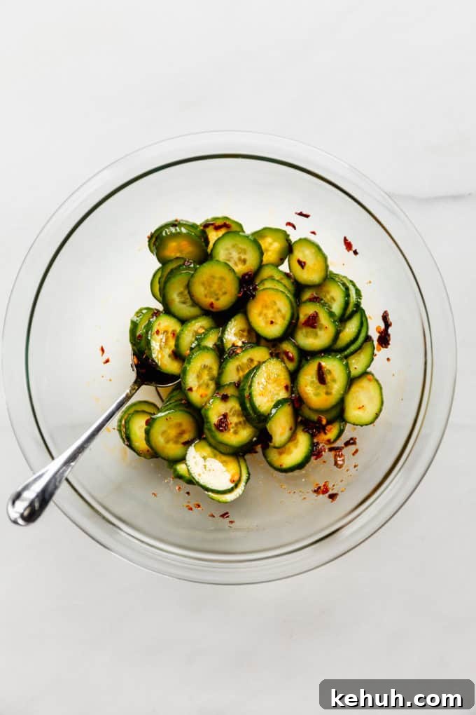 Quick Asian Cucumber Salad Ready in 10 Minutes 8 Asian cucumber salad in a mixing bowl
