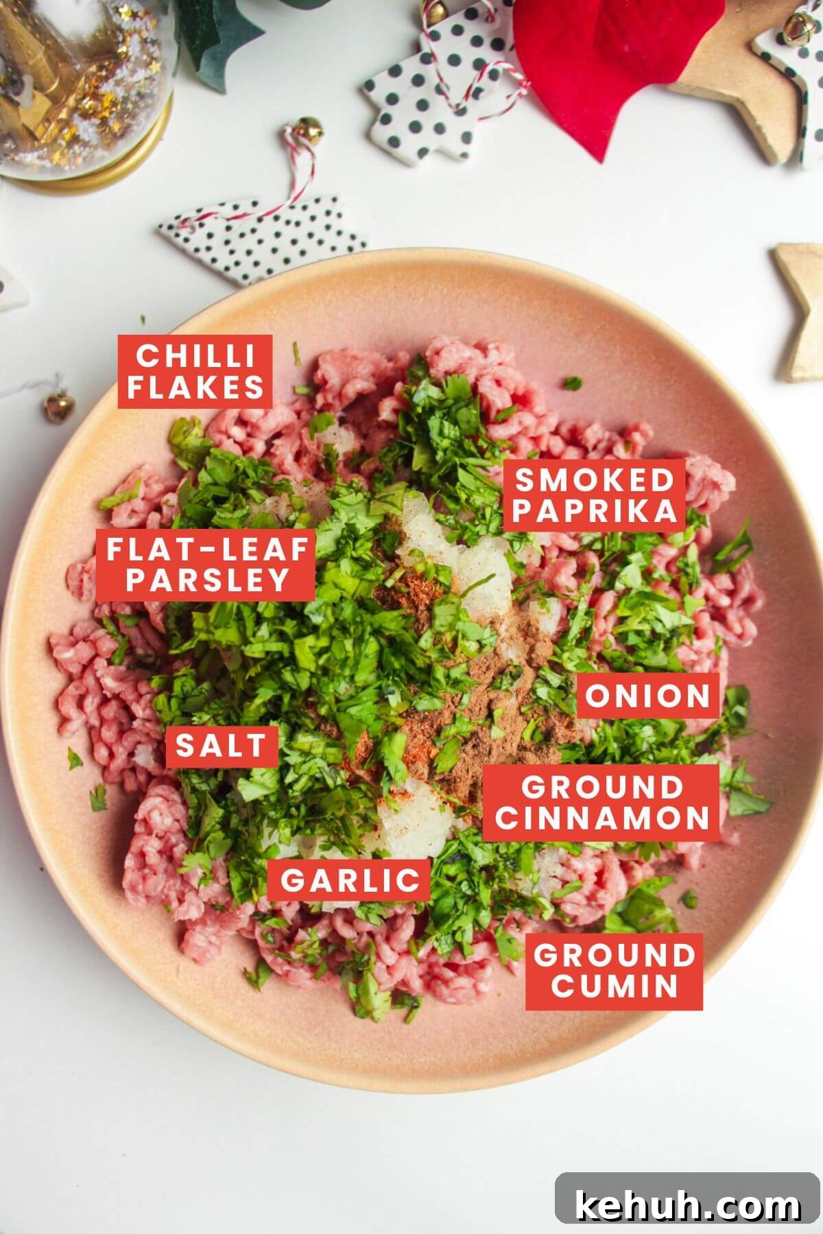 Festive Mini Meatballs Recipe for Holiday Appetizers 3 Meatball ingredients in a pink bowl and labelled.