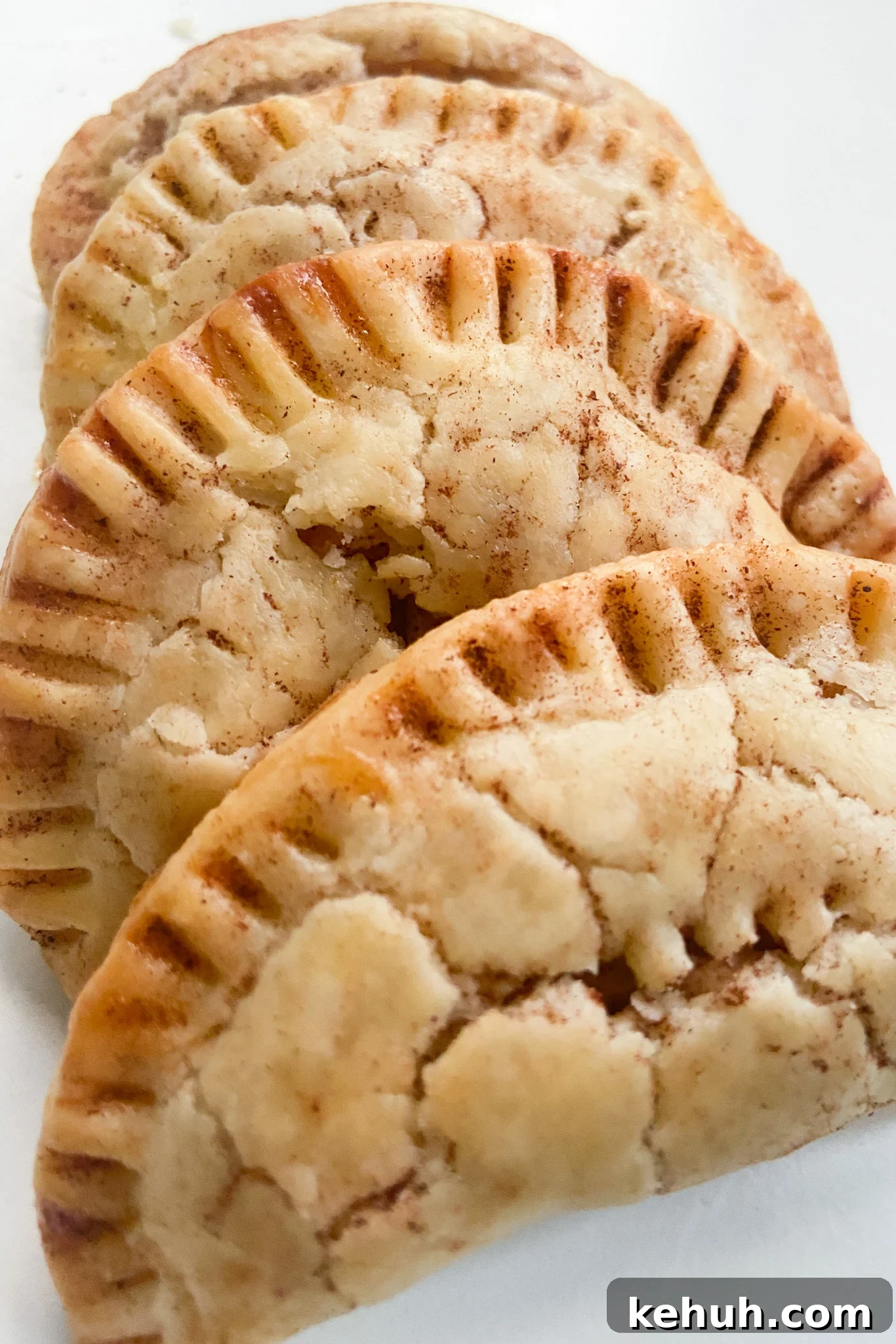Crispy Apple Pie Empanadas: Homemade Recipe for Fall Desserts 5 Four apple pie empanadas
