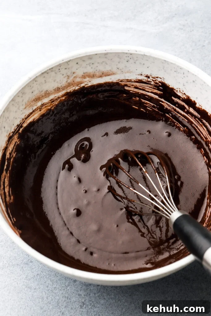 Decadent Chocolate Brownie Pie Recipe for Chocolate Lovers 11 eggs, sugar and cocoa powder whisked together