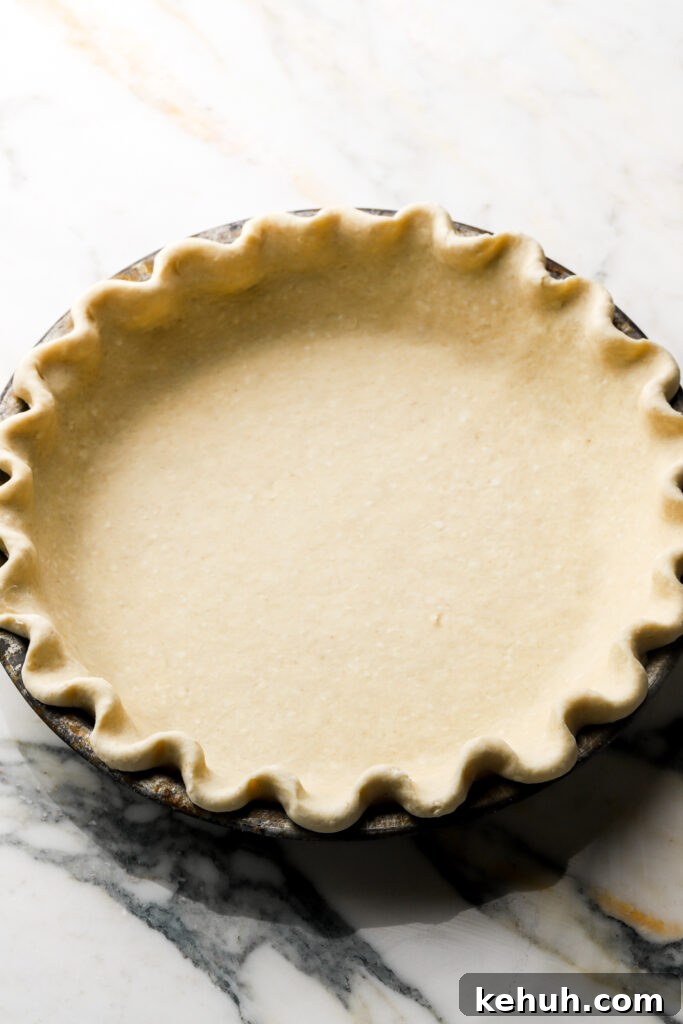 Decadent Chocolate Brownie Pie Recipe for Chocolate Lovers 7 raw pie crust in prepared pan