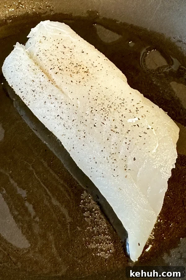 Garlic Butter Cod with Roasted Asparagus — Quick Weeknight Dinner 3 cod in skillet
