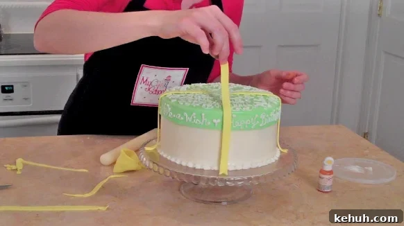 Adorable hat box cake with a frosted lid! Free cake tutorial by My Cake School!