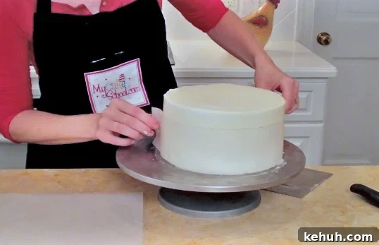 Learn how to make a CUTE hat box cake with a frosted lid in this My Cake School free cake tutorial!