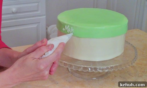 Learn how to make a BEAUTIFUL hat box cake with a frosted lid in this MyCakeSchool.com free tutorial!