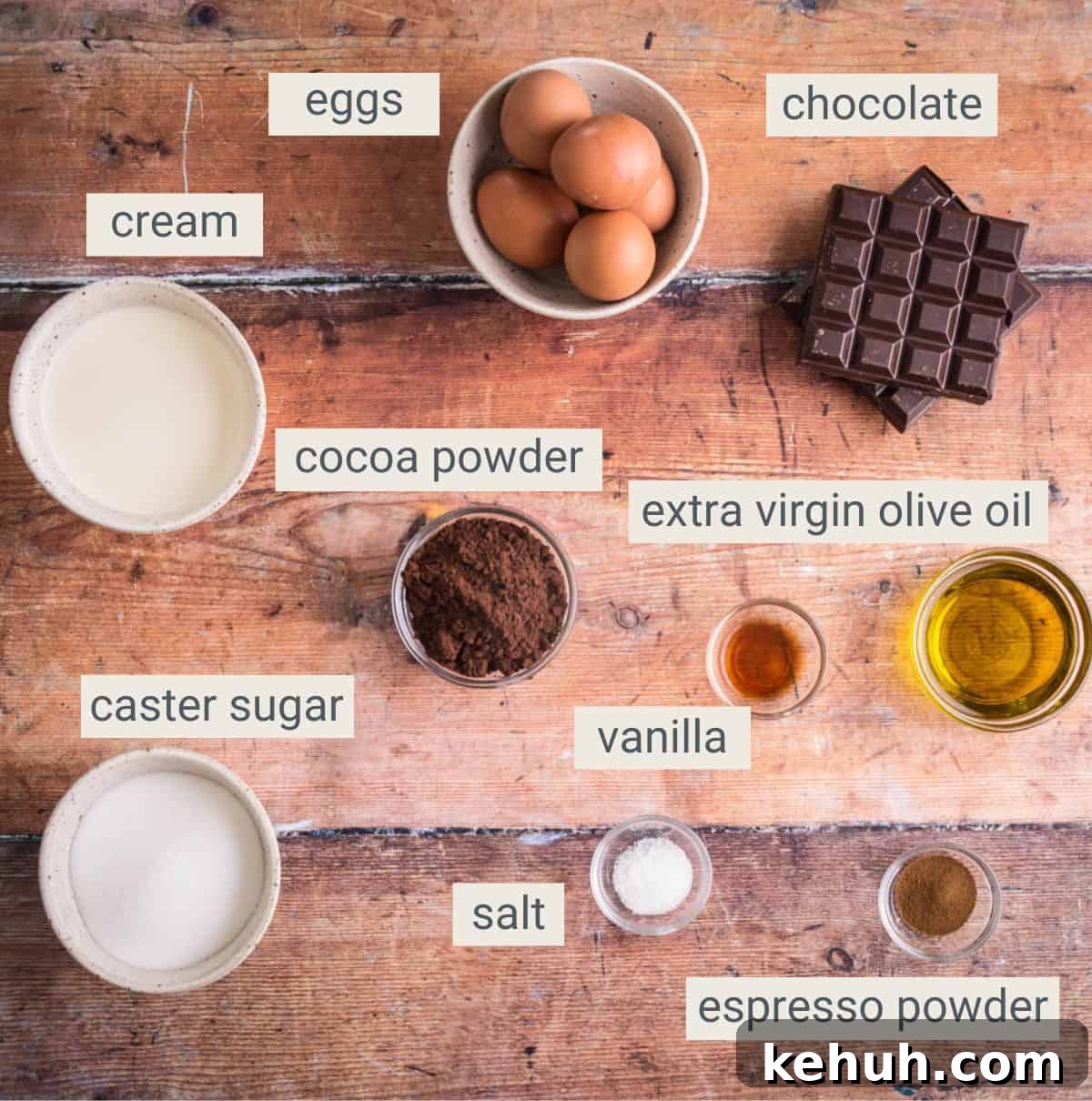 Olive Oil Chocolate Cake (Flourless, Rich & Decadent) 4 Flourless Olive Oil Chocolate Cake ingredients on a table.