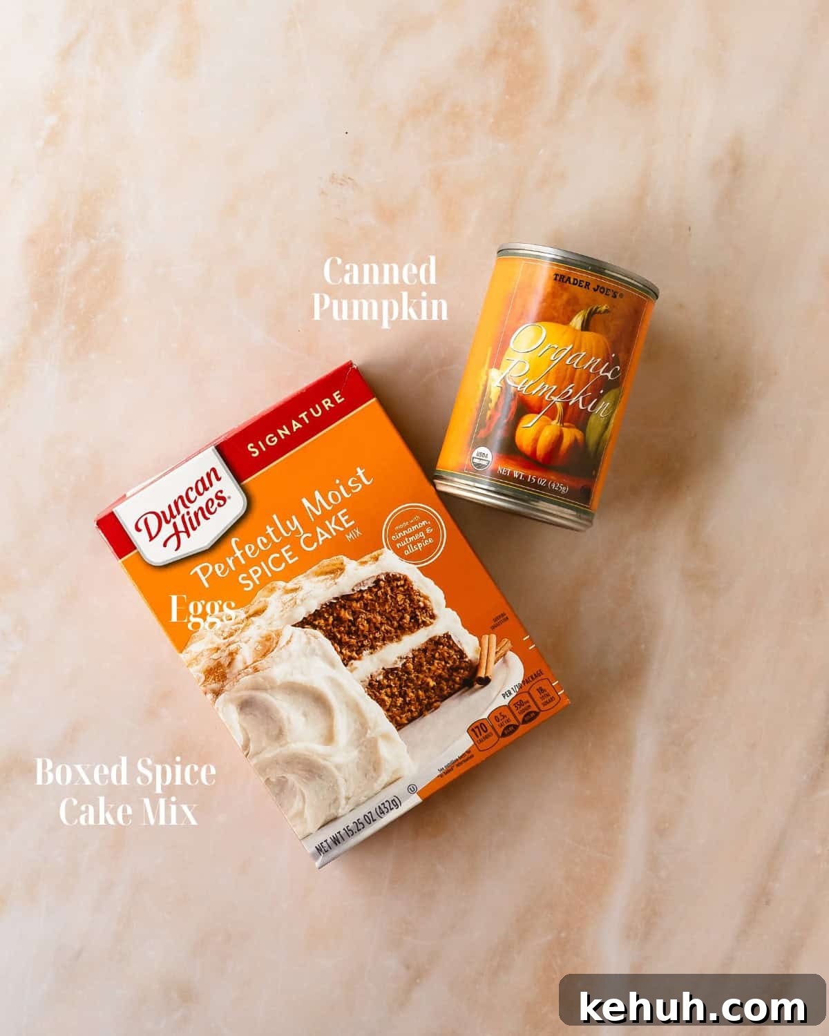 Gather spiced cake mix and a can of pumpkin puree. 