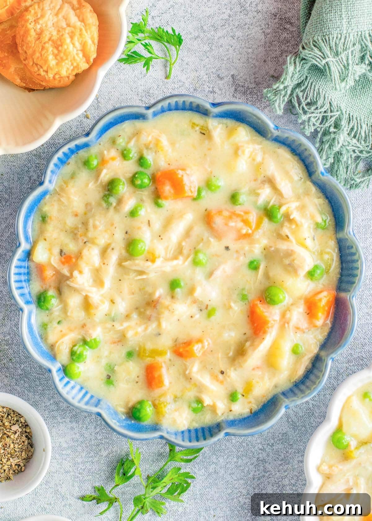 Instant Pot Chicken Pot Pie Soup Recipe — Cozy One-Pot Meal 2 chicken soup in a blue bowl.