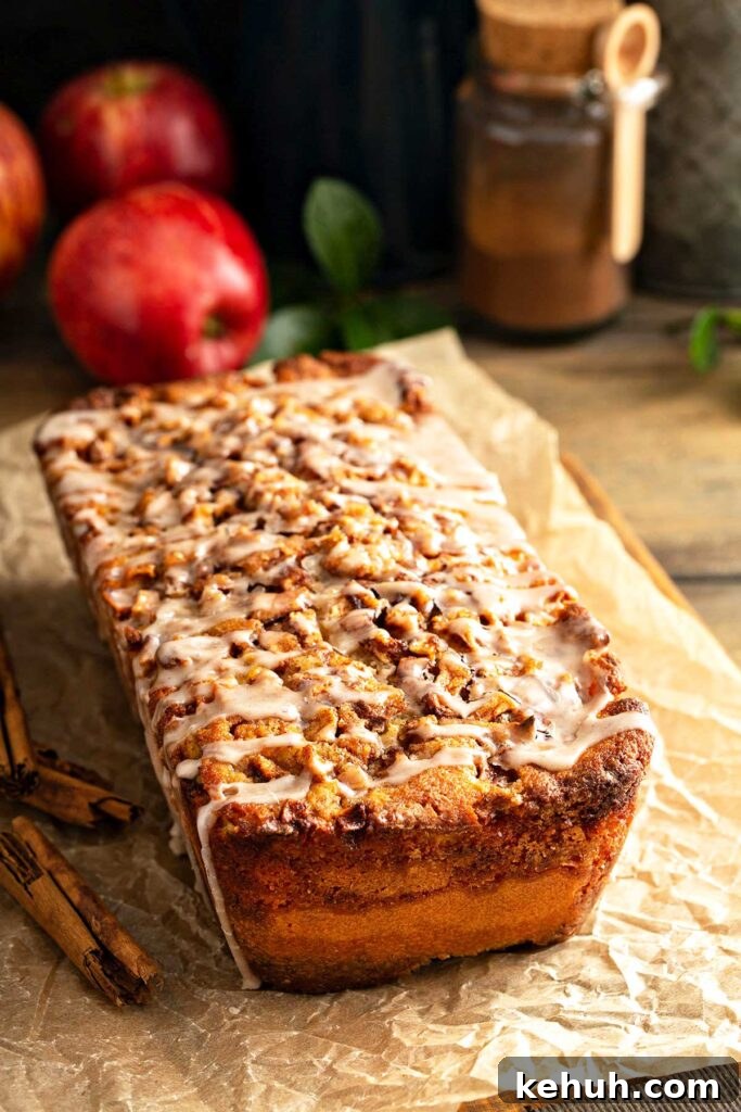 Cinnamon Apple Quick Bread Recipe for Moist, Spiced Loaves 10 A loaf of apple bread with cinnamon sugar topping and drizzles with cinnamon glaze.