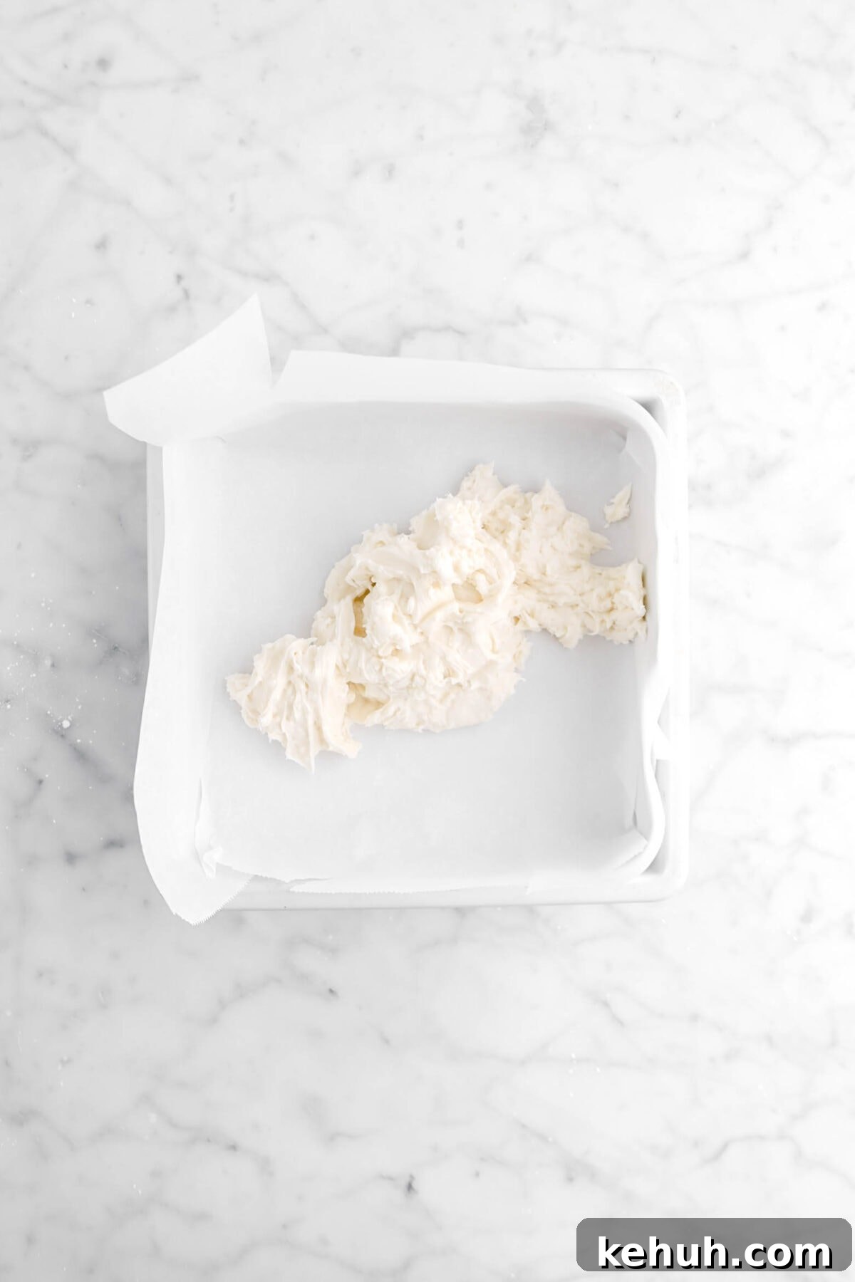 Coconut Cream-Filled Chocolate Truffles: Decadent Homemade Recipe 11 coconut fondant piled in lined square pan