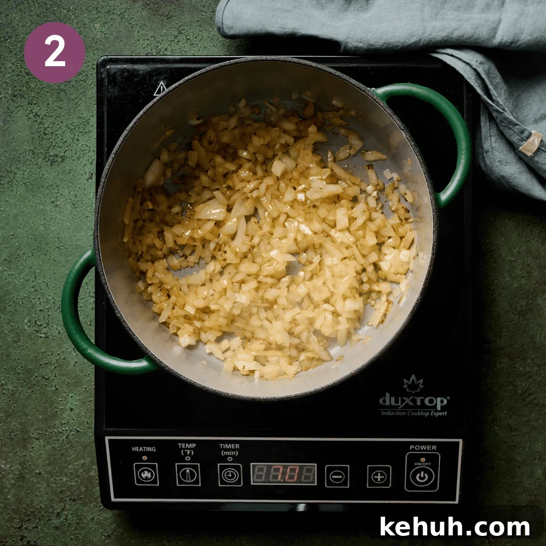 Golden brown onions once they've been cooked in a dutch oven.