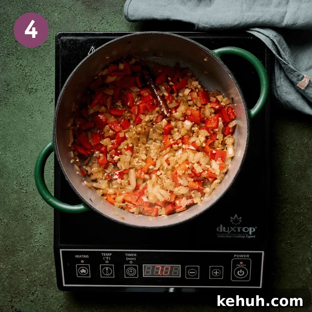 Onion bell pepper mixture after it's been cooked for a few minutes.