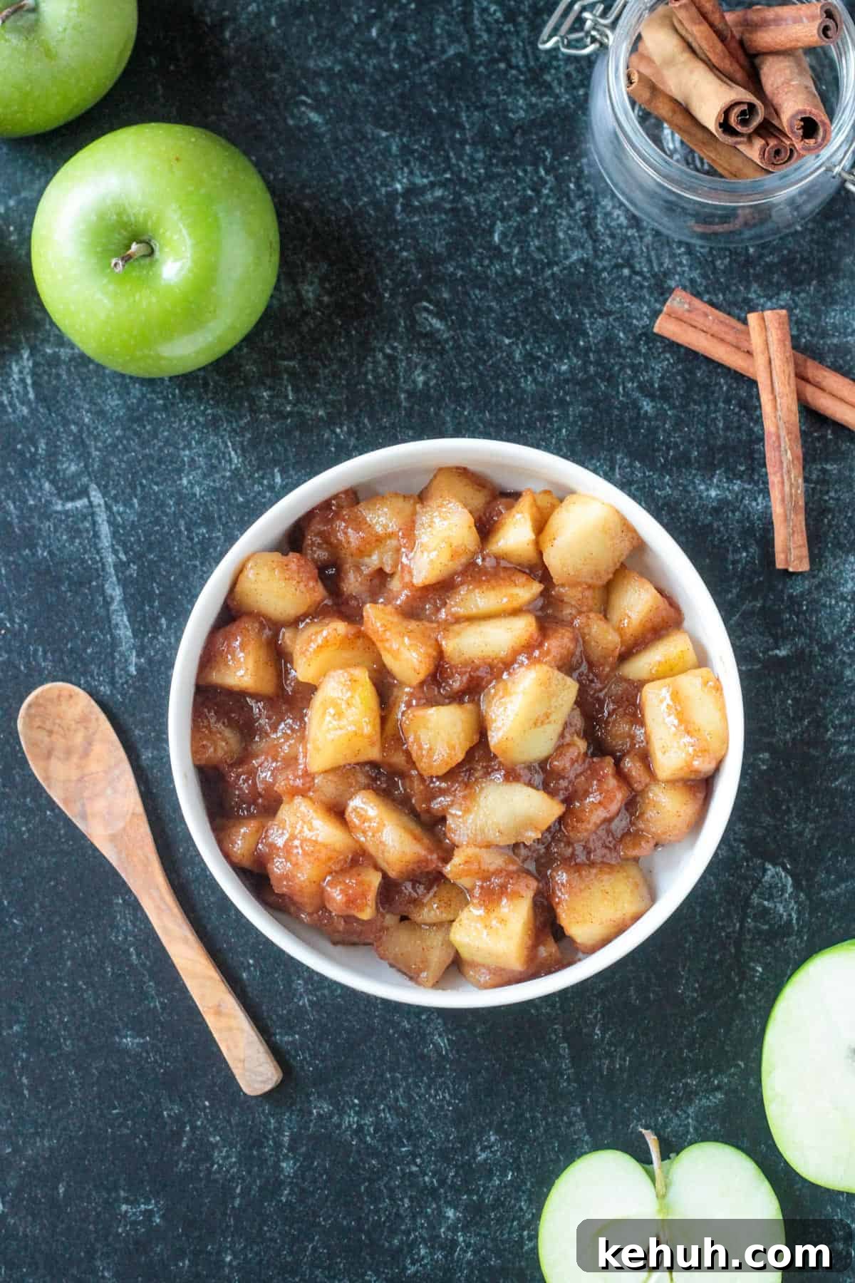 Stovetop Cinnamon Apples Recipe — Quick Comfort Dessert 10 Cinnamon spiced apples in a bowl.