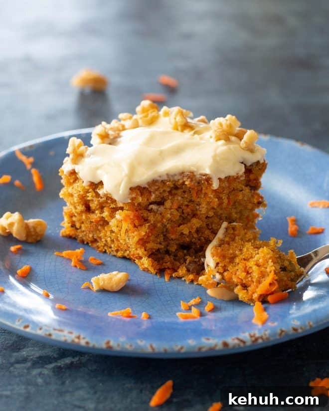Classic Moist Carrot Cake Recipe with Cream Cheese Frosting 2 carrot cake with bite