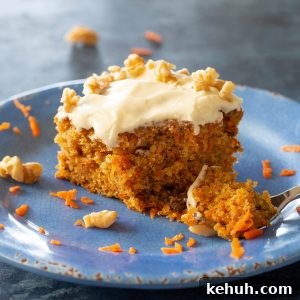 Classic Moist Carrot Cake Recipe with Cream Cheese Frosting 6 carrot cake with bite taken out