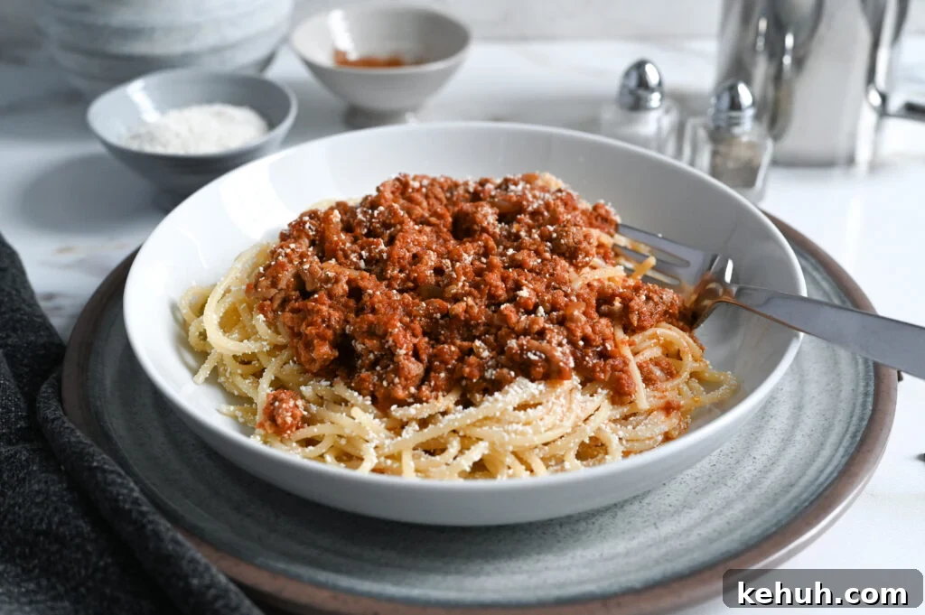 Greek-style spaghetti with meat sauce