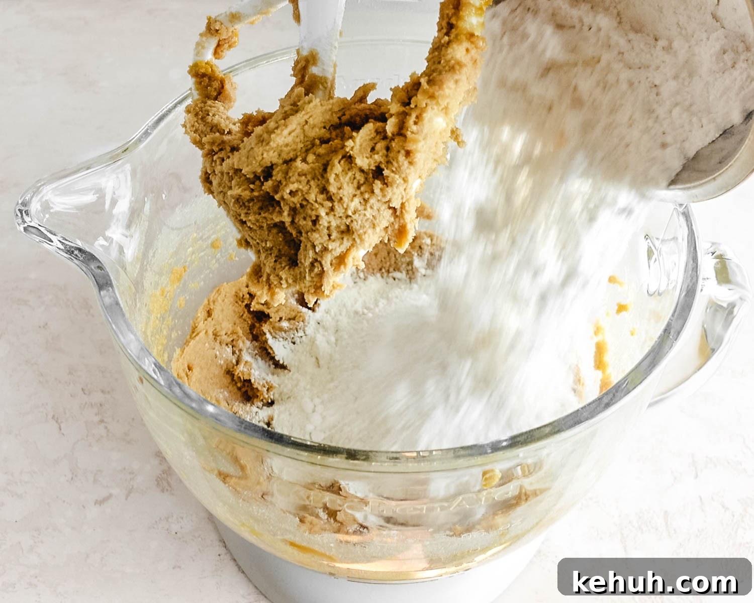 Add the cake flour to the mixing bowl.