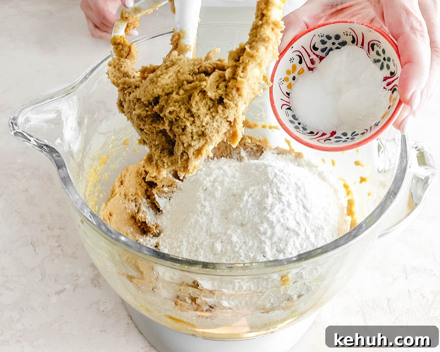 Add baking soda, baking powder, and salt to the mixing bowl.