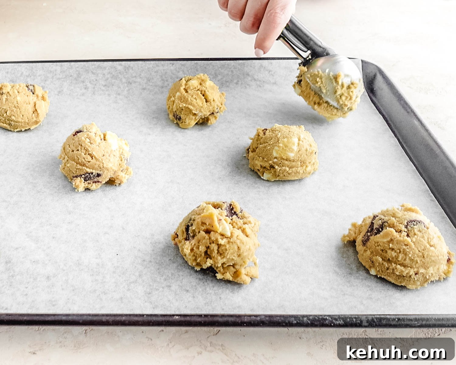 Place cookie dough on parchment lined baking sheet a few inches apart to allow room for spreading.