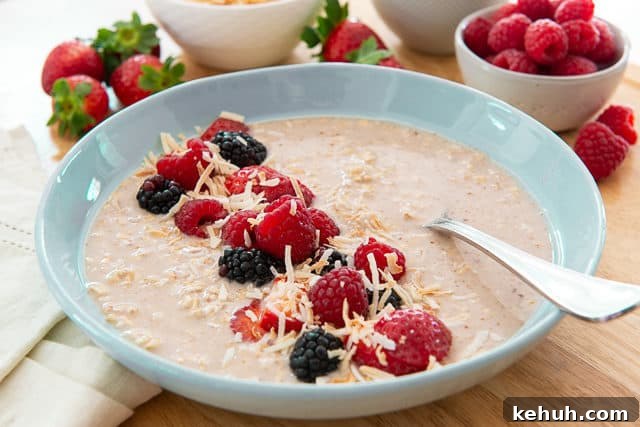 Healthy Overnight Oats - Pictured in Low Blue Bowl with Spoon as Dairy Free Option