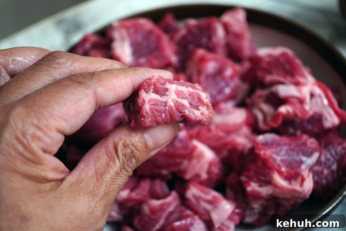 Instant Pot Beef and Cabbage Stew Recipe for Tender Meat 4 Slice the Beef Into Bite Size Pieces