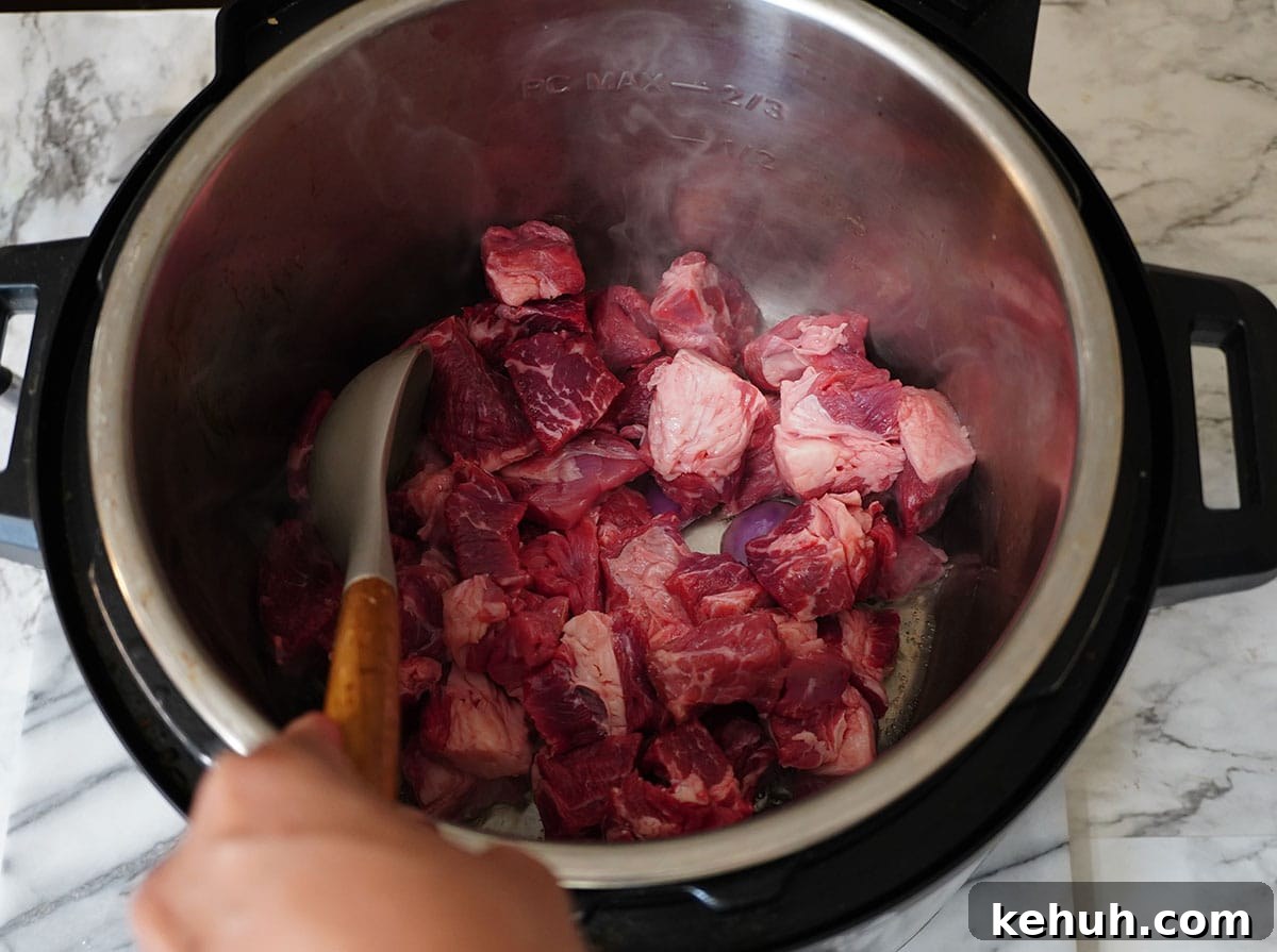Instant Pot Beef and Cabbage Stew Recipe for Tender Meat 6 Brown on all sides