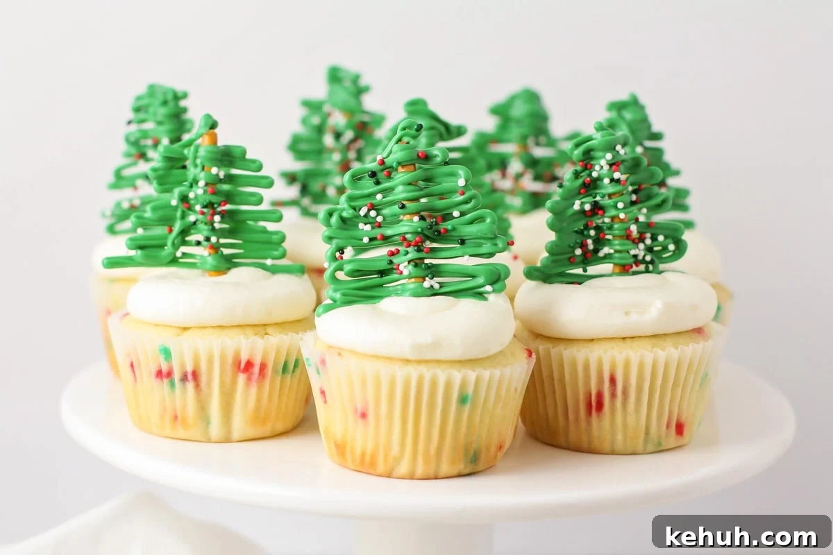 Christmas cupcakes on cake stand.