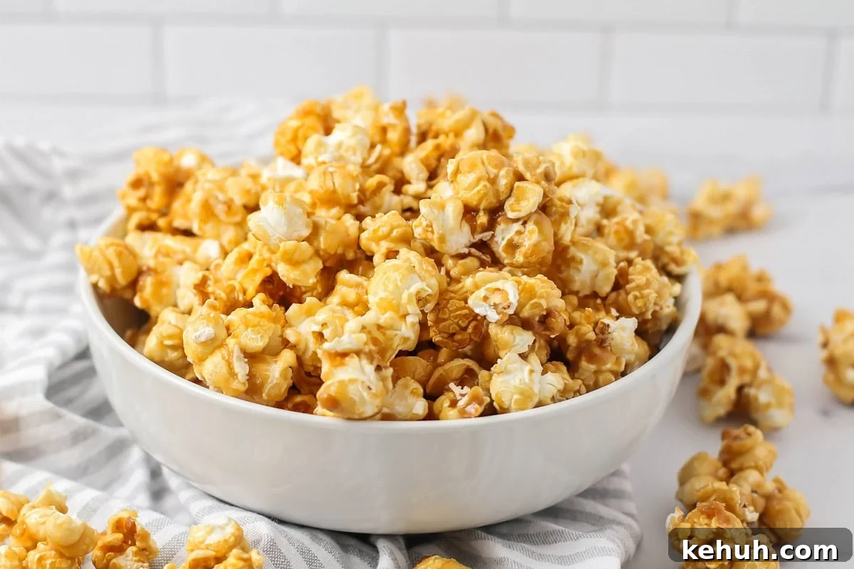 Homemade caramel popcorn recipe in white bowl.