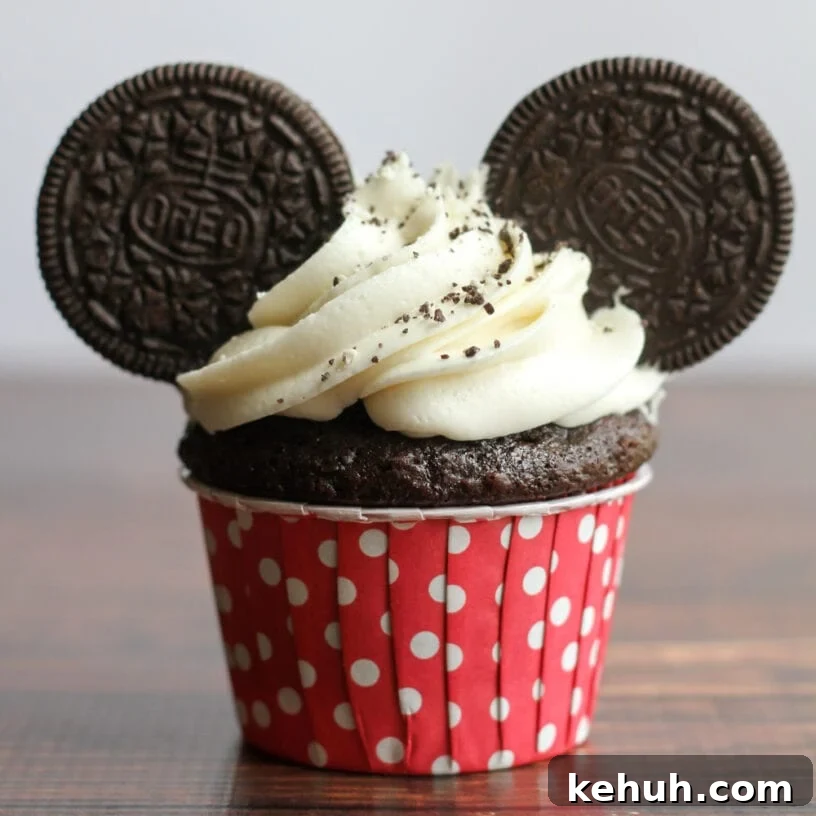Mickey mouse cupcakes on counter.