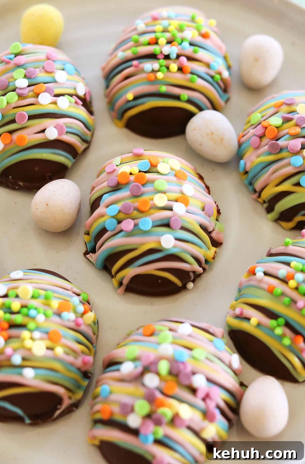 These Healthy Chocolate Peanut Butter Eggs are an easy no-bake Easter treat made with just a few simple ingredients! A healthier version of Reese's eggs that are gluten-free and refined sugar-free!