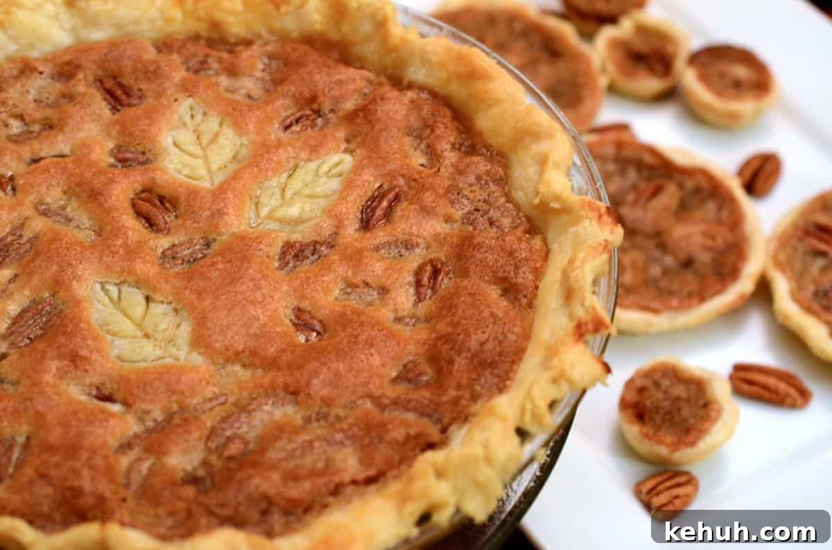 A whole pecan pie and some mini pecan pies.