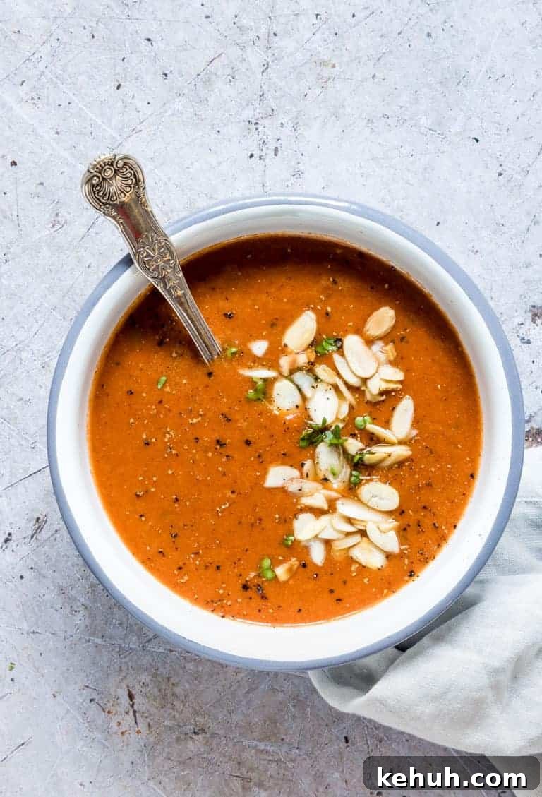 Instant Pot Soup Recipes You’ll Actually Love 19 tomato soup topped with almonds and herbs