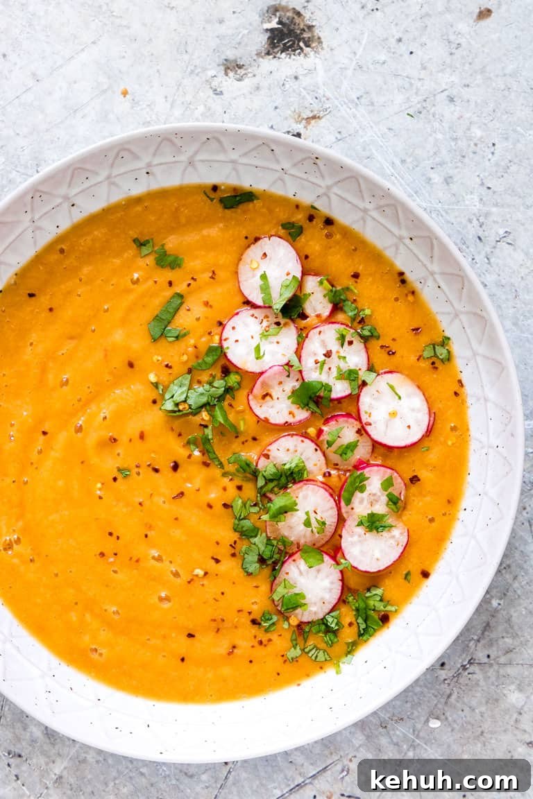 Instant Pot Soup Recipes You’ll Actually Love 23 cauliflower soup garnished with greens