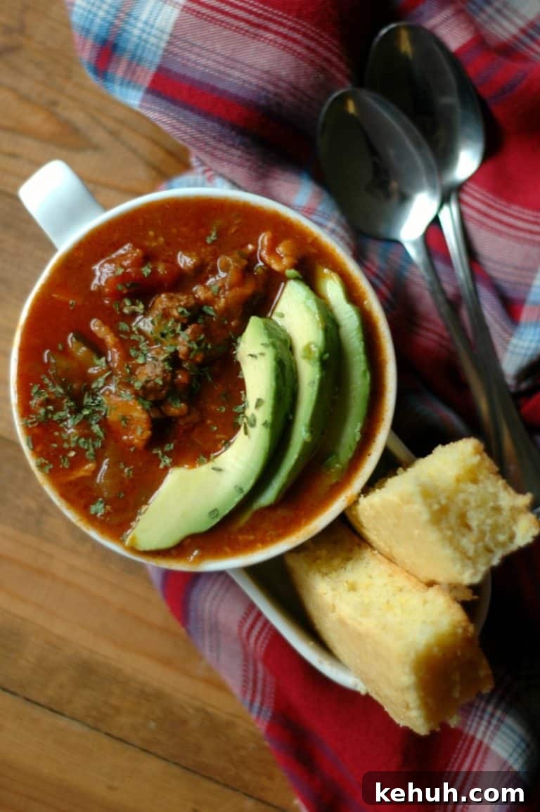 Instant Pot Soup Recipes You’ll Actually Love 35 chipotle chili garnished with avocado