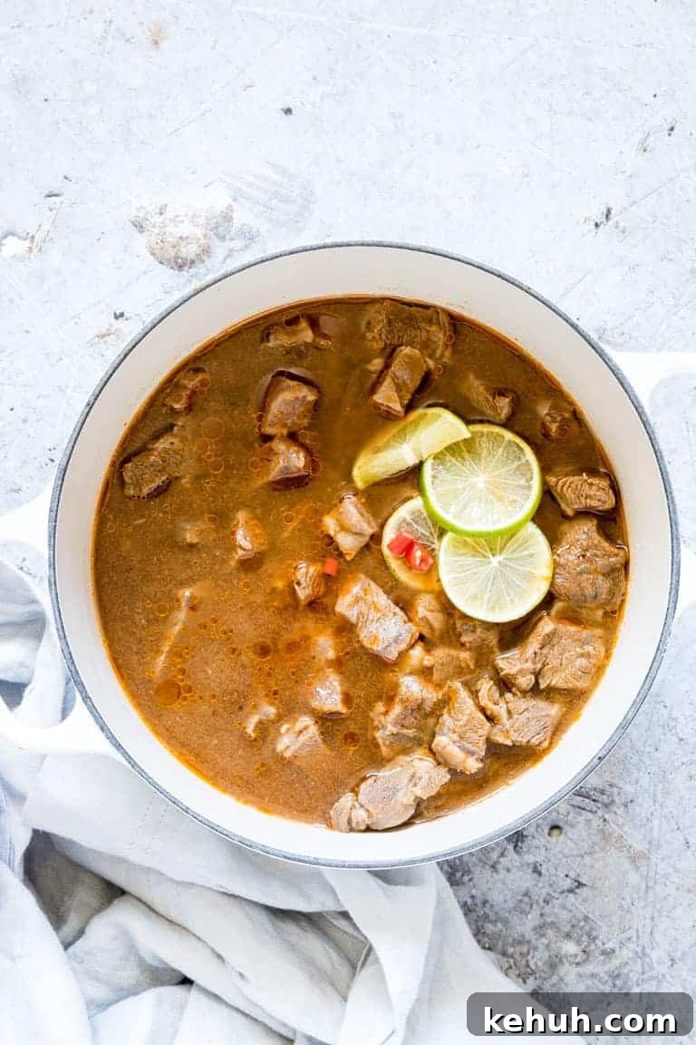 Instant Pot Soup Recipes You’ll Actually Love 10 African Pepper Soup in a pot with lime garnish