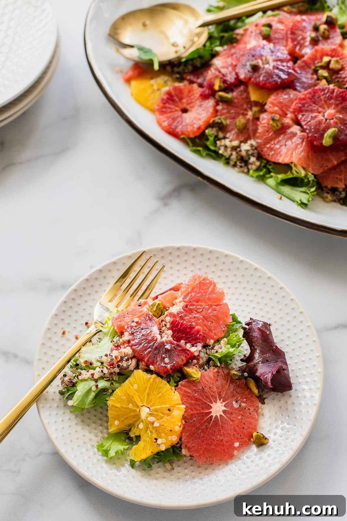 Citrus Quinoa Salad with Avocado and Mint 6 a plate of citrus salad
