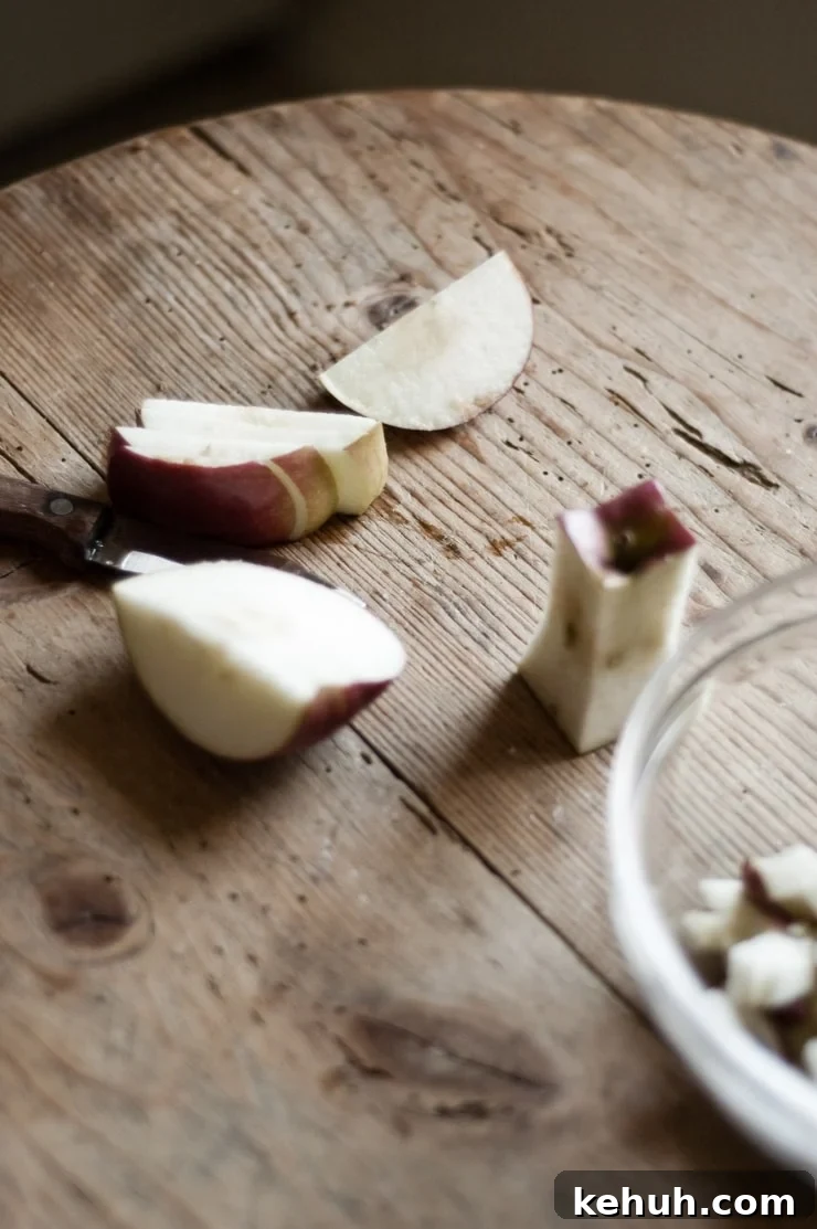 Moist Apple Harvest Loaf Cake Recipe for Fall Baking 4 Sliced and cored apples