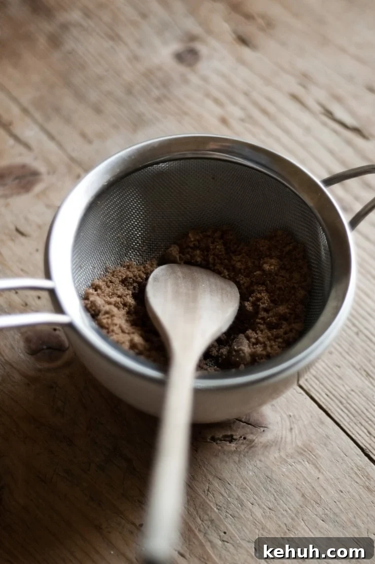 Moist Apple Harvest Loaf Cake Recipe for Fall Baking 5 Muscovado Sugar in Sieve