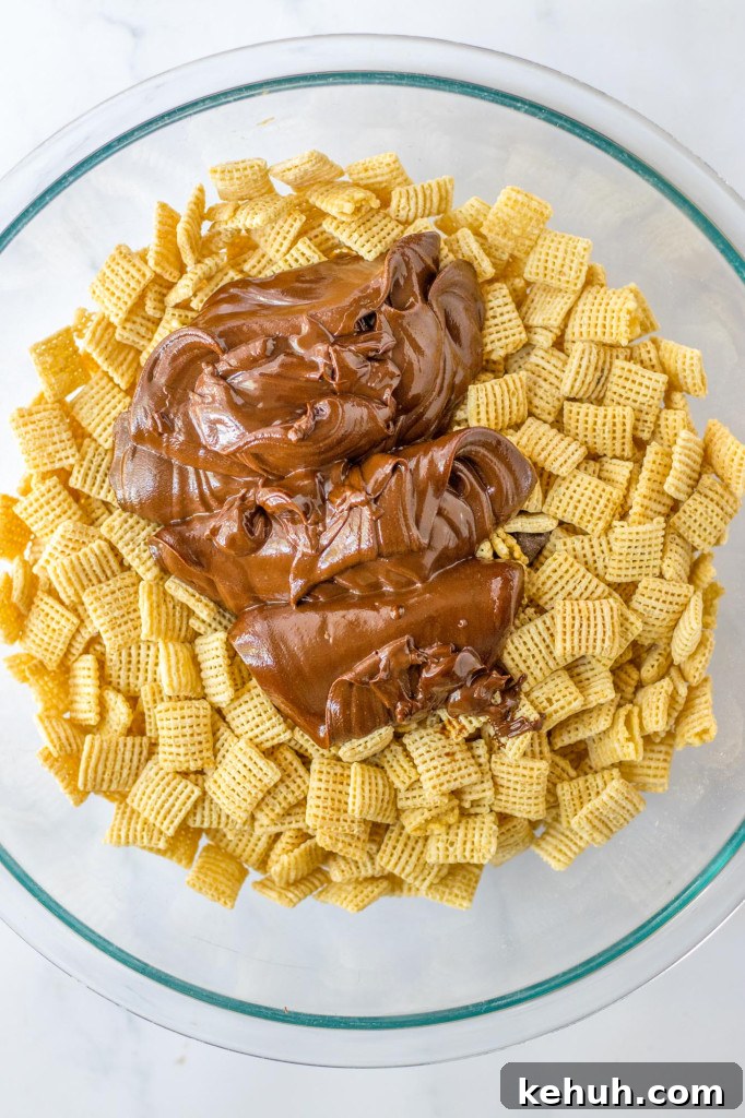 Autumn Puppy Chow: Cozy No-Bake Snack Mix Recipe 6 Coated cereal in a bowl